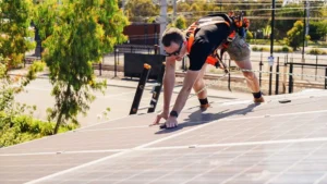 Electrician working on solar panels
