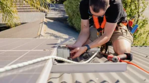 electrician fixing solar panels on roof in Ringwood